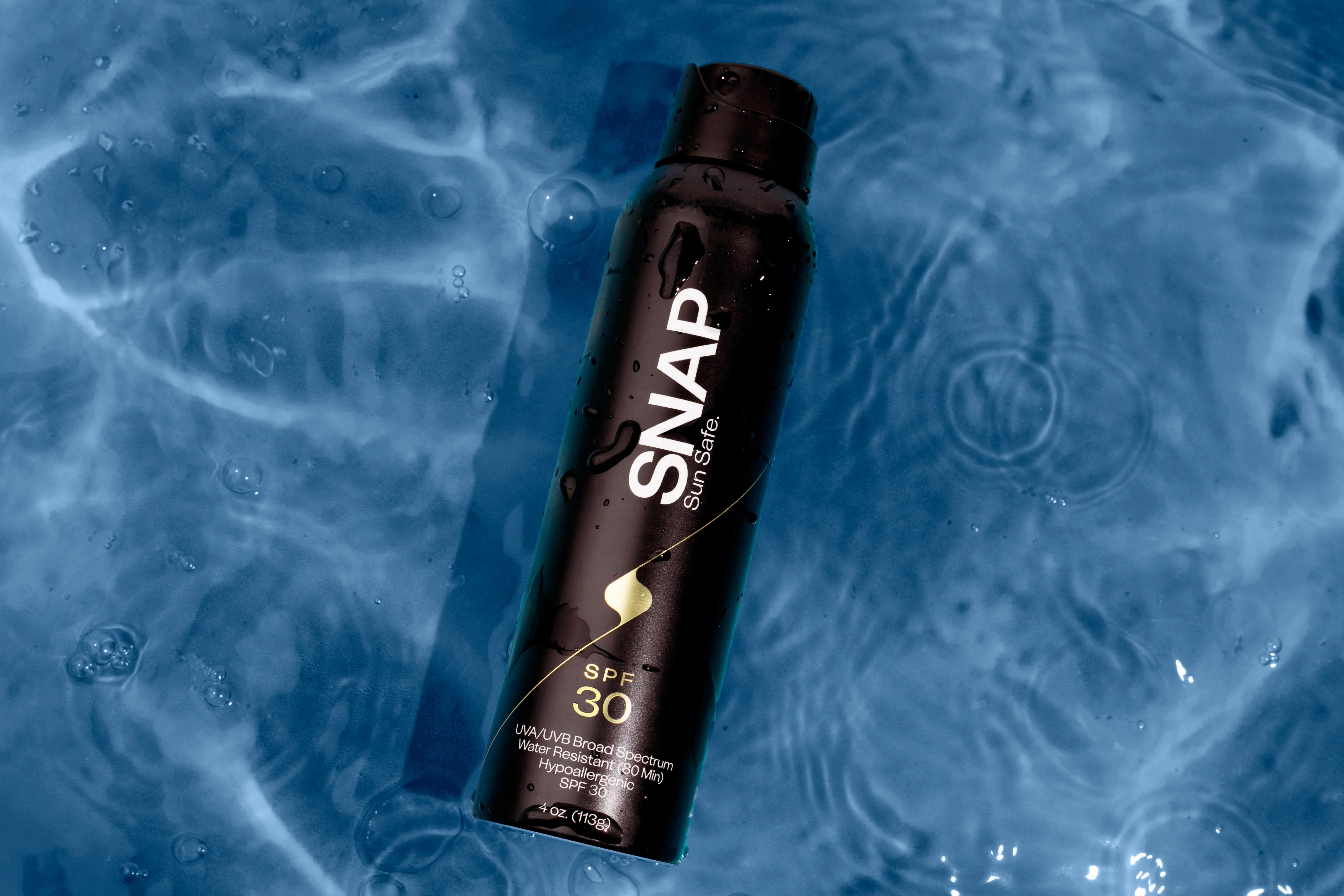 SNAP Wellness Everyday Sunscreen SPF 30 in blue water - As featured in our touchless sunscreen application booth the SnappyScreen Machine