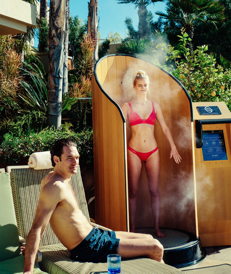 SnappyScreen Machine on pool deck. Touchless sunscreen application booth as featured in 5-star hotels worldwide.